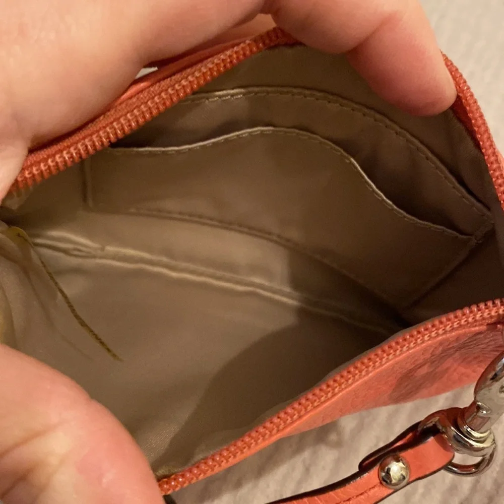 Coach Coral and Taupe Leather Clutch / wristband. Set